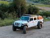 Jeep Gladiator mit Front Runner Dachträger, beladen